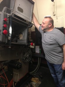 Loew's Jersey projectionist with his "baby"